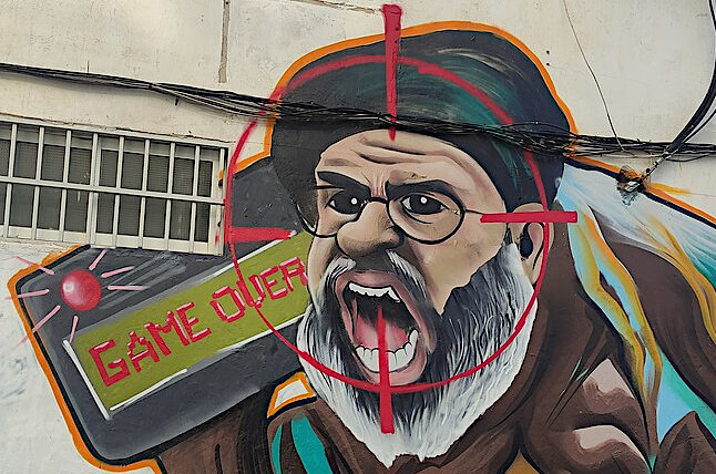 Graffiti showing Nasrallah with exploding pager